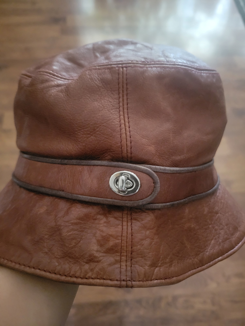 Coach Brown Leather Bucket Hat with Silver Turnlock Accent